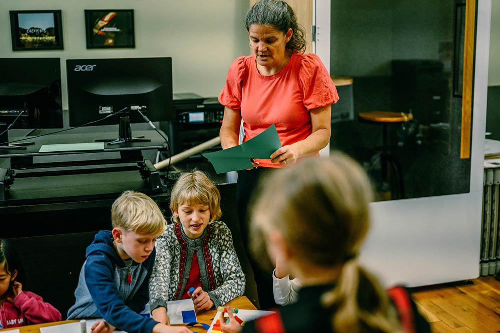 Teacher and children